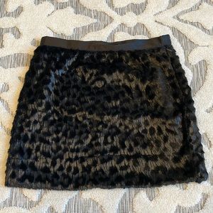 Nikibiki faux fur black mini skirt with side zip
